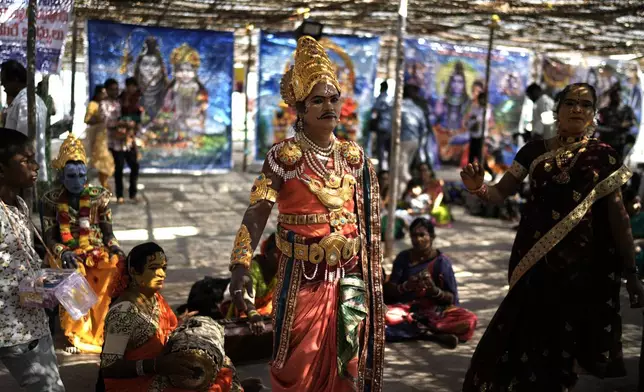 Devotees enact scenes from Hindu epics at the Lingamanthula Swamy temple during a Hindu pilgrimage called the Peddagattu Jatara, in Suryapet, Telangana state, India, Sunday, Feb. 16, 2025. (AP Photo /Mahesh Kumar A.)