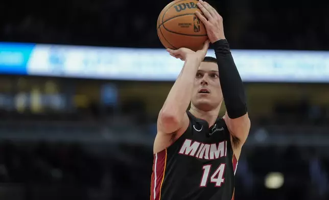 Miami Heat guard Tyler Herro (14) takes a free throw during the first half of an NBA basketball game against the Chicago Bulls, Tuesday, Feb. 4, 2025, in Chicago. (AP Photo/Erin Hooley)