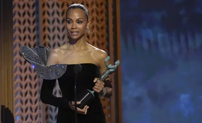 Zoe Saldana accepts the award for outstanding performance by a female actor in a supporting role in a motion picture for "Emilia Perez" during the 31st annual Screen Actors Guild Awards on Sunday, Feb. 23, 2025, at the Shrine Auditorium in Los Angeles. (AP Photo/Chris Pizzello)