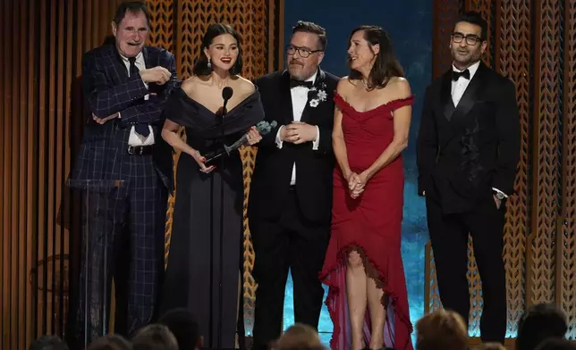 Richard Kind, from left, Selena Gomez, Michael Cyril Creighton, Molly Shannon, and Kumail Nanjiani accept the award for outstanding performance by an ensemble in a comedy series for "Only Murders In The Building" during the 31st annual Screen Actors Guild Awards on Sunday, Feb. 23, 2025, at the Shrine Auditorium in Los Angeles. (AP Photo/Chris Pizzello)
