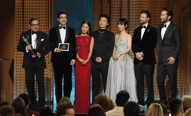Hiroyuki Sanada, from left, Tadanobu Asano, Anna Sawai, Hiroto Kanai, Moeka Hoshi, Tommy Bastow, and Shinnosuke Abe accept the award for outstanding performance by an ensemble in a drama series for "Shogun" during the 31st annual Screen Actors Guild Awards on Sunday, Feb. 23, 2025, at the Shrine Auditorium in Los Angeles. (AP Photo/Chris Pizzello)
