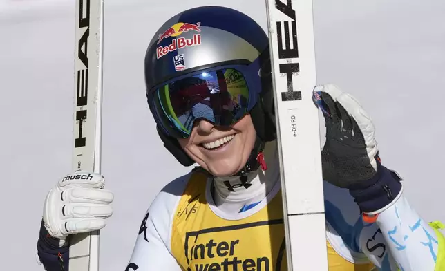 United States' Lindsey Vonn smiles at the finish area of a women's downhill race, at the Alpine Ski World Championships, in Saalbach-Hinterglemm, Austria, Saturday, Feb. 8, 2025. (AP Photo/Giovanni Auletta)