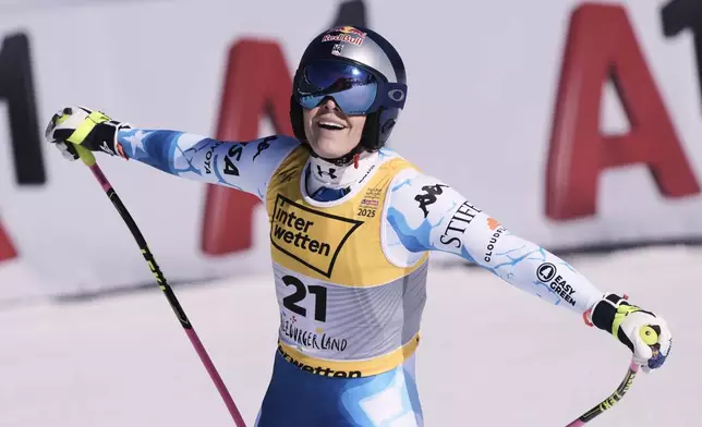 United States' Lindsey Vonn celebrates at the finish area of a women's downhill race, at the Alpine Ski World Championships, in Saalbach-Hinterglemm, Austria, Saturday, Feb. 8, 2025. (AP Photo/Giovanni Auletta)