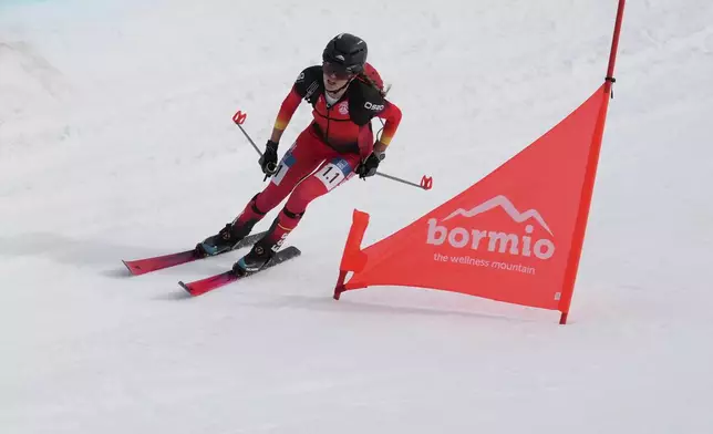 Spain's Ana Alonso Rodriguez competes during the women's mixed relay race at the Ski Mountaineering World Cup event in Bormio, Italy, Sunday, Feb. 23, 2025. (AP Photo/Antonio Calanni)