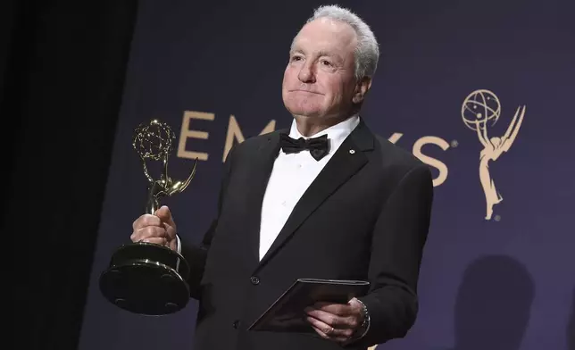 FILE - Lorne Michaels poses in the press room with the award for outstanding variety sketch series for "Saturday Night Live" at the 71st Primetime Emmy Awards on Sunday, Sept. 22, 2019, in Los Angeles. (Photo by Jordan Strauss/Invision/AP, File)