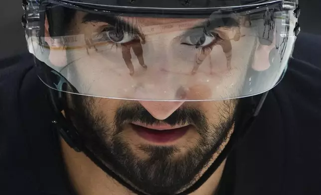 Seattle Kraken center Matty Beniers looks on during a face-off against the Toronto Maple Leafs during the second period of an NHL hockey game Thursday, Feb. 6, 2025, in Seattle. (AP Photo/Lindsey Wasson)
