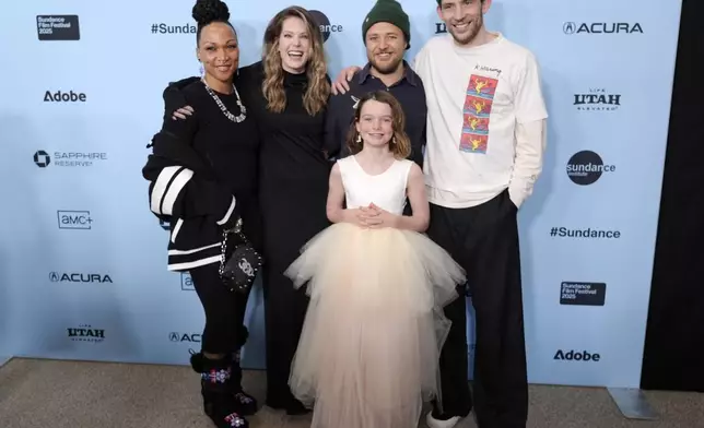 Max Walker-Silverman, second right, writer/director of "Rebuilding," poses with cast members, from left, Kali Reis, Meghann Fahy, Lily Latorre and Josh O'Connor at the premiere of the film during the Sundance Film Festival on Sunday, Jan. 26, 2025, in Park City, Utah. (AP Photo/Chris Pizzello)
