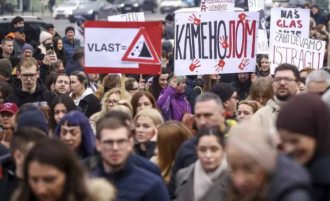 People take part in a protest seeking answers after last year's devastating floods and landslides in the country, in Sarajevo, Bosnia, Monday, Feb. 10, 2025. (AP Photo/Armin Durgut)