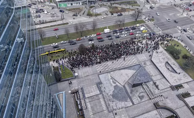 An aerial view of people during a protest seeking answers after last year's devastating floods and landslides in the country, in Sarajevo, Bosnia, Monday, Feb. 10, 2025. (AP Photo/Armin Durgut)