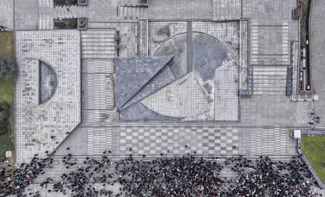 An aerial view of people during a protest seeking answers after last year's devastating floods and landslides in the country, in Sarajevo, Bosnia, Monday, Feb. 10, 2025. (AP Photo/Armin Durgut)