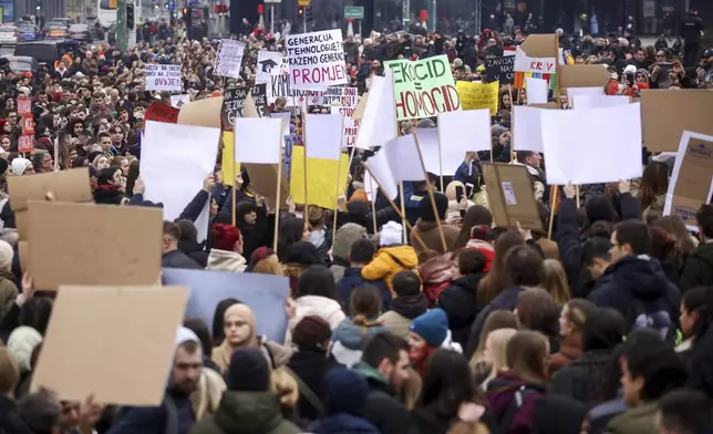 People take part in a protest seeking answers after last year's devastating floods and landslides in the country, in Sarajevo, Bosnia, Monday, Feb. 10, 2025. (AP Photo/Armin Durgut)