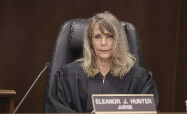 Los Angeles County Superior Court Judge Eleanor J. Hunter listens to opening statements by prosecutor Senior Deputy District Attorney, Seton Hunt at the trial of Jeffrey Ferguson, an Orange County Superior Court judge, who allegedly pulled a gun from his ankle holster and fatally shot his wife, at the Santa Ana Courthouse in Santa Ana, Calif., on Wednesday, Feb. 19, 2025. (Frederick M. Brown/Pool Photo via AP, Pool)