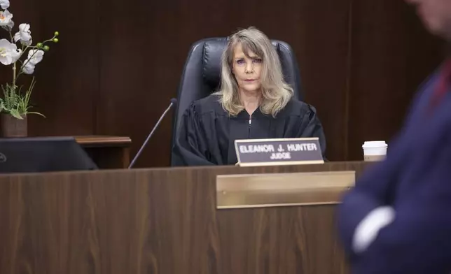Los Angeles County Superior Court Judge Eleanor J. Hunter listens to opening statements at the trial of Jeffrey Ferguson, an Orange County Superior Court judge, who allegedly pulled a gun from his ankle holster and fatally shot his wife, at the Santa Ana Courthouse in Santa Ana, Calif., on Wednesday, Feb. 19, 2025. (Frederick M. Brown/Pool Photo via AP)