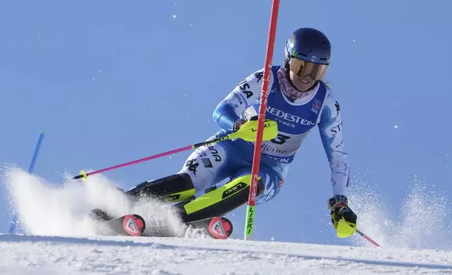 United States' Paula Moltzan competes in a women's slalom, at the Alpine Ski World Championships, in Saalbach-Hinterglemm, Austria, Saturday, Feb. 15, 2025. (AP Photo/Giovanni Auletta)