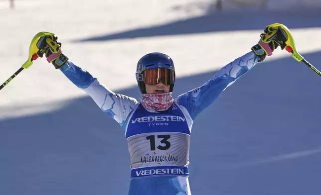 United States' Paula Moltzan celebrates at the finish area of a women's slalom, at the Alpine Ski World Championships, in Saalbach-Hinterglemm, Austria, Saturday, Feb. 15, 2025. (AP Photo/Giovanni Auletta)