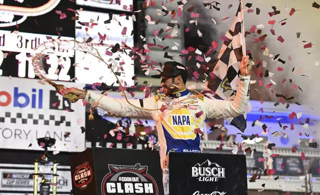 Chase Elliott celebrates in Victory Lane after winning a NASCAR Cup Series auto race at Bowman Gray Stadium, Sunday, Feb. 2, 2025, in Winston-Salem, N.C. (AP Photo/Matt Kelley)