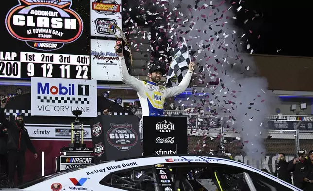 Chase Elliott celebrates in Victory Lane after winning a NASCAR Cup Series auto race at Bowman Gray Stadium, Sunday, Feb. 2, 2025, in Winston-Salem, N.C. (AP Photo/Matt Kelley)