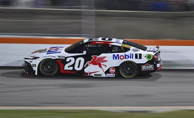 Christopher Bell steers down the front stretch during a NASCAR Cup Series auto race at Bowman Gray Stadium, Sunday, Feb. 2, 2025, in Winston-Salem, N.C. (AP Photo/Matt Kelley)