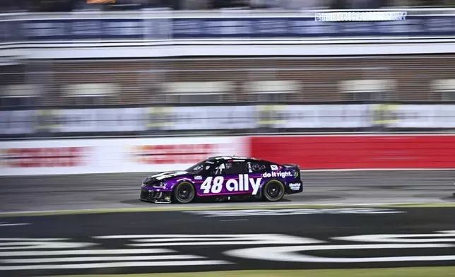 Alex Bowman steers into Turn 4 during a NASCAR Cup Series auto race at Bowman Gray Stadium, Sunday, Feb. 2, 2025, in Winston-Salem, N.C. (AP Photo/Matt Kelley)