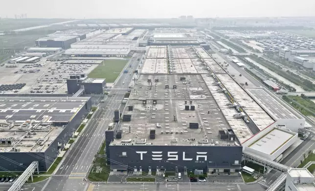 FILE - In this photo released by Xinhua News Agency, the Tesla Gigafactory in Lingang new area of the China (Shanghai) Pilot Free Trade Zone is seen in east China's Shanghai on Sept. 26, 2023. (Liu Ying/Xinhua via AP, File)