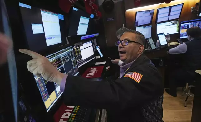 FILE - Trader Jonathan Mueller works on the floor of the New York Stock Exchange, Tuesday, Feb. 4, 2025. (AP Photo/Richard Drew, file)