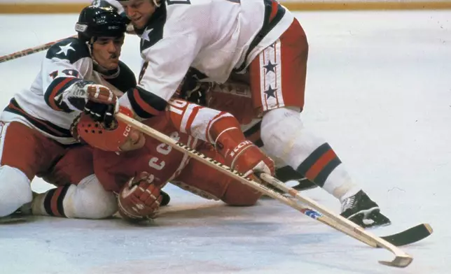 FILE - Team USA plays against Team USSR in the men's semi-finals Olympic hockey game during the XIII Winter Olympic Games at Lake Placid, N.Y., Feb. 22, 1980. (AP Photo)