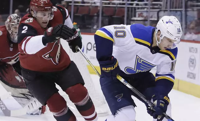 FILE - Arizona Coyotes defenseman Luke Schenn (2) and St. Louis Blues center Brayden Schenn (10) in the first period during an NHL hockey game, March 31, 2018, in Glendale, Ariz. (AP Photo/Rick Scuteri, file)