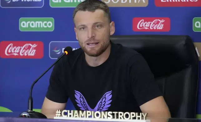 England's captain Jos Buttler speaks during a press conference regarding their ICC Champions Trophy cricket match against Australia, in Lahore, Pakistan, Friday, Feb. 21, 2025. (AP Photo/K.M Chaudary)