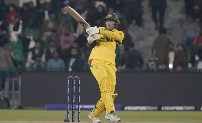 Australia's Alex Carey bats during the ICC Champions Trophy cricket match between Australia and England, in Lahore, Pakistan, Saturday, Feb. 22, 2025. (AP Photo/K.M. Chaudary)