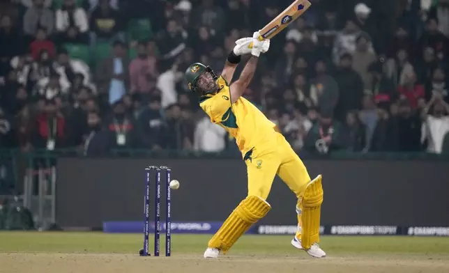 Australia's Glenn Maxwell plays a shot during the ICC Champions Trophy cricket match between Australia and England, in Lahore, Pakistan, Saturday, Feb. 22, 2025. (AP Photo/K.M. Chaudary)
