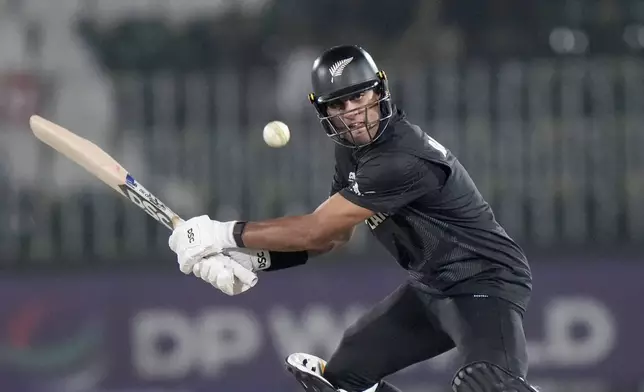 New Zealand's Rachin Ravindra plays a shot during the ICC Champions Trophy cricket match between Bangladesh and New Zealand, in Rawalpindi, Pakistan Monday, Feb. 24, 2025,. (AP Photo/Anjum Naveed)
