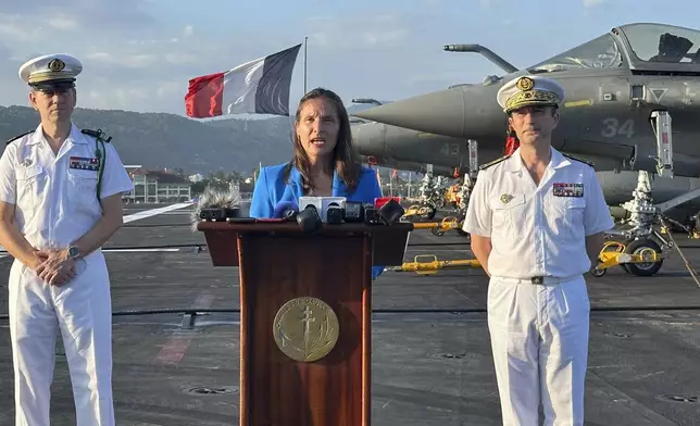 French Ambassador Marie Fontanel speaks during a news conference onboard French aircraft carrier The Charles de Gaulle at Subic Bay port, a former U.S. Naval base northwest of Manila, Philippines, Sunday, Feb. 23, 2025. (AP Photo/Joeal Calupitan)