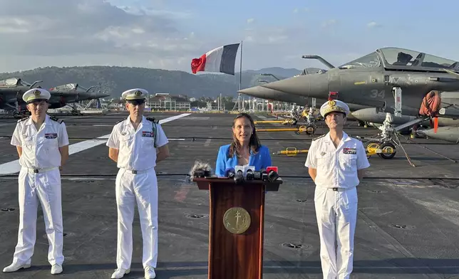 French Ambassador Marie Fontanel speaks during a news conference onboard French aircraft carrier The Charles de Gaulle at Subic Bay port, a former U.S. Naval base northwest of Manila, Philippines, Sunday, Feb. 23, 2025. (AP Photo/Joeal Calupitan)