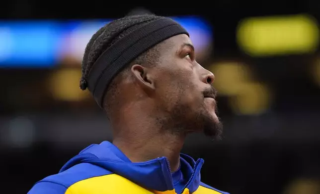 Golden State Warriors forward Jimmy Butler warms up before an NBA basketball game against the Chicago Bulls, Saturday, Feb. 8, 2025, in Chicago. (AP Photo/Erin Hooley)