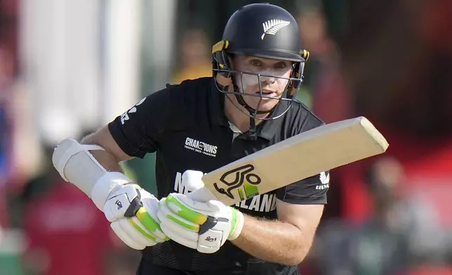 New Zealand's Tom Latham bats during the ICC Champions Trophy cricket match between Pakistan and New Zealand, in Karachi, Pakistan Wednesday, Feb. 19, 2025. (AP Photo/Anjum Naveed)