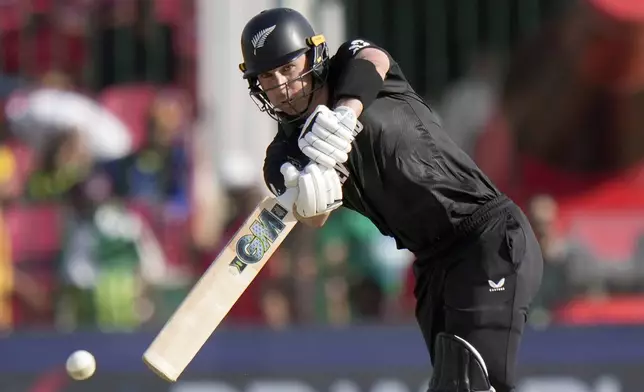 New Zealand's Will Young plays a shot during the ICC Champions Trophy cricket match between Pakistan and New Zealand, in Karachi, Pakistan Wednesday, Feb. 19, 2025. (AP Photo/Anjum Naveed)