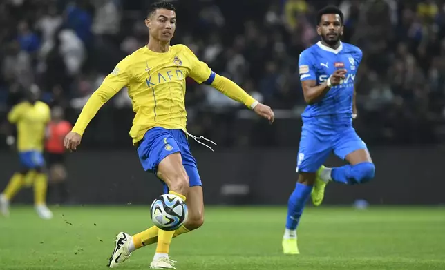 FILE - Al Nassr's Cristiano Ronaldo kicks the ball during Riyadh Season Cup 2024 final match against Al Hilal at Kingdom Arena Stadium in Riyadh, Saudi Arabia, Thursday, Feb. 8, 2024. (AP Photo, File)