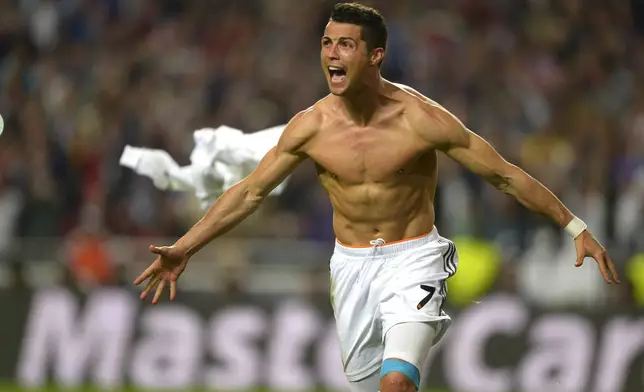FILE - Real's Cristiano Ronaldo, gestures, at the end of the Champions League final soccer match between Atletico Madrid and Real Madrid, at the Luz stadium, in Lisbon, Portugal, in Lisbon, Portugal, Saturday, May 24, 2014. (AP Photo/Manu Fernandez, File)