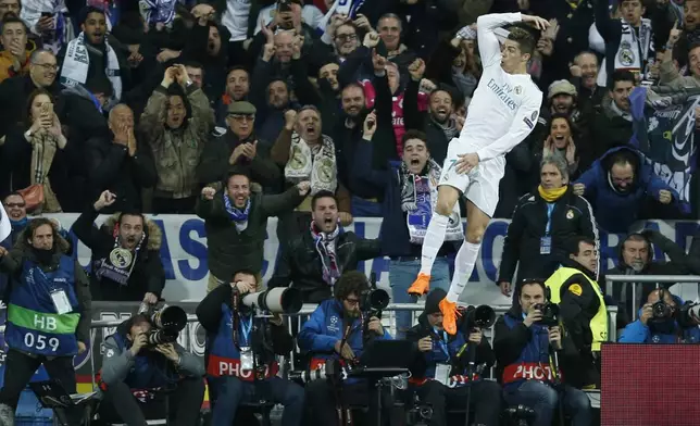 FILE - Real Madrid's Cristiano Ronaldo celebrates his side's 2nd goal during a Champions League Round of 16 first leg soccer match between Real Madrid and Paris Saint Germain at the Santiago Bernabeu stadium in Madrid, Spain, Wednesday, Feb. 14, 2018. (AP Photo/Francisco Seco, File)