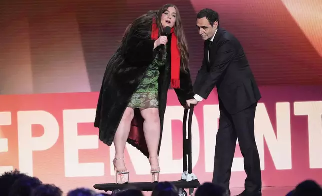 Host Aidy Bryant, left, and Karren Karagulian appear onstage during the Film Independent Spirit Awards on Saturday, Feb. 22, 2025, in Santa Monica, Calif. (AP Photo/Chris Pizzello)
