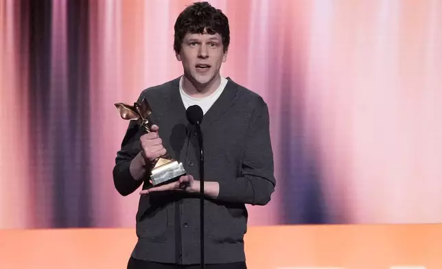 Jesse Eisenberg accepts the award for best screenplay for "A Real Pain" during the Film Independent Spirit Awards on Saturday, Feb. 22, 2025, in Santa Monica, Calif. (AP Photo/Chris Pizzello)