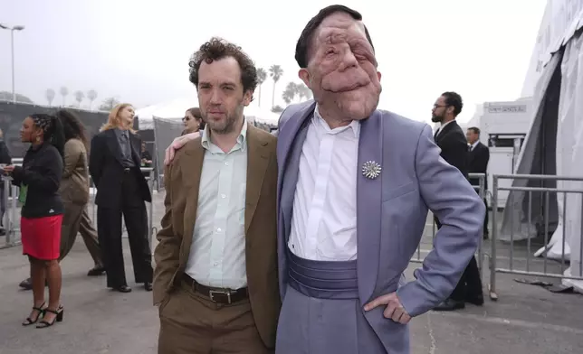 Aaron Schimberg, left, and Adam Pearson arrive at the Film Independent Spirit Awards on Saturday, Feb. 22, 2025, in Santa Monica, Calif. (AP Photo/Chris Pizzello)