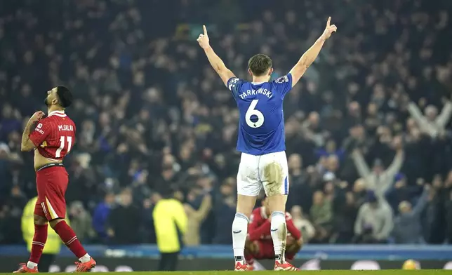 Everton's James Tarkowski reacts during the English Premier League soccer match between Everton and Liverpool, Liverpool, England, Wednesday, Feb.12, 2025. (AP Photo/Dave Thompson)
