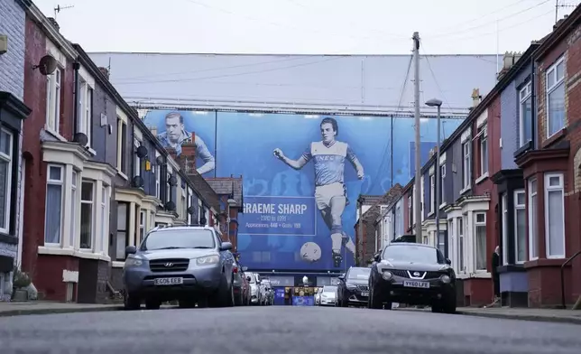 Cars are parking outside of the of Goodison Park stadium ahead of the English Premier League soccer match between Everton and Liverpool, Liverpool, England, Wednesday, Feb.12, 2025. (AP Photo/Dave Thompson)