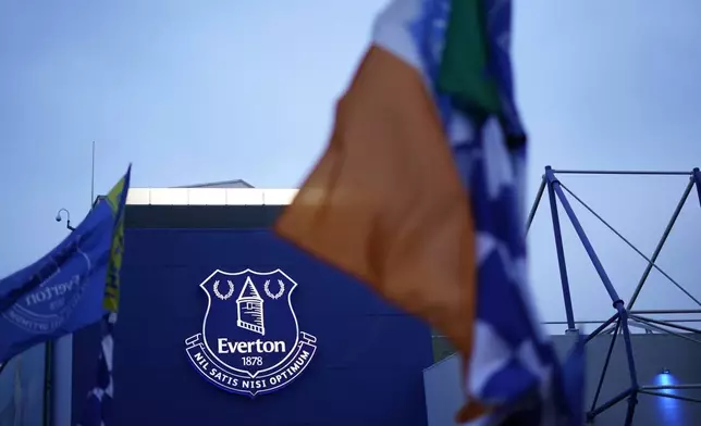 A logo of Everton's soccer team is seen outside of Goodison Park stadium ahead of the English Premier League soccer match between Everton and Liverpool in Liverpool, England, Wednesday, Feb.12, 2025. (AP Photo/Dave Thompson)