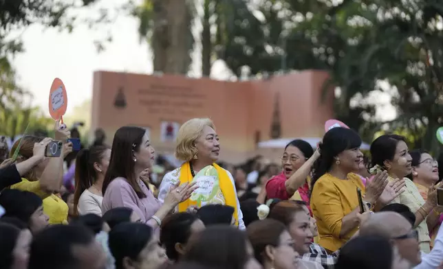 People watch performance competition show aiming to submit the traditional culture of Thanakha to UNESCO's Intangible Cultural Heritage of Humanity, Wednesday, Feb.12, 2025 in Yangon, Myanmar. (AP Photo/Thein Zaw)