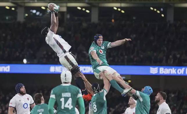 England's Maro Itoje wins a line out during the Six Nations rugby union match between Ireland and England at the Aviva Stadium in Dublin, Saturday, Feb. 1, 2025. (AP Photo/Peter Morrison)