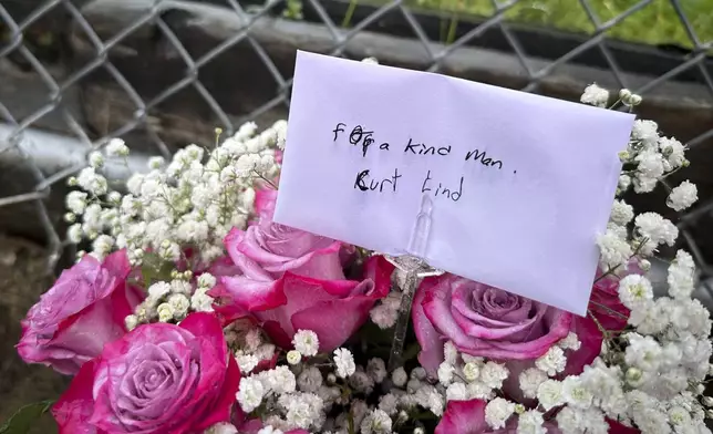 Flowers sit outside the property where San Francisco Bay Area prosecutors say Maximilian Snyder killed landlord Curtis Lind in Vallejo, California, Friday, Jan. 31, 2025. (AP Photo/Janie Har)