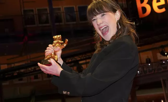 Hege Hauff Hvattum, winner of the Golden Bear for best film for 'Dreams (Sex Love)', poses for photographers at the winners photo call during the International Film Festival, Berlinale, in Berlin, Saturday, Feb. 22, 2025. (Photo by Scott A Garfitt/Invision/AP).
