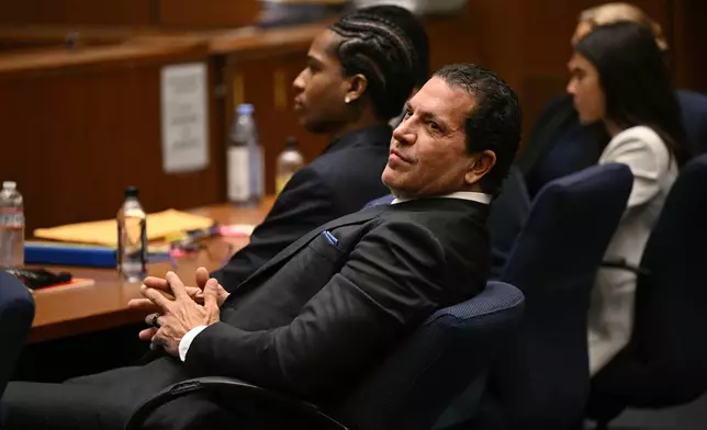 Attorney Joe Tacopina sits next to his client A$AP Rocky during Rocky's trial, in Los Angeles, Friday, Feb. 14, 2025, . (Patrick T. Fallon/Pool Photo via AP)